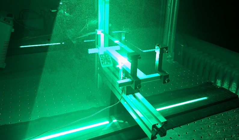 Particle image velocimetry measurement for force distribution analysis of the discharge-related momentum transfer.